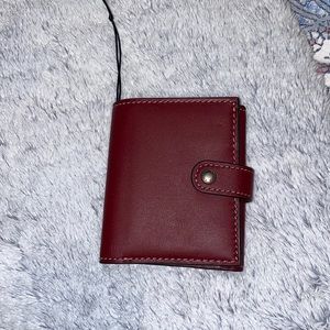 Coach small trifold wallet in glove tanned Bordeaux and 1941 Red leather.